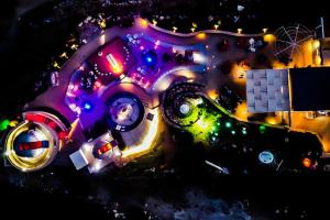 an overhead view of a group of objects with lights at Astronomy Studios in Faliraki