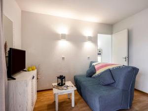 TV a/nebo společenská místnost v ubytování Apartment Les Alcyons T2 by Interhome