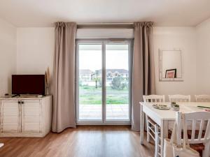 TV a/nebo společenská místnost v ubytování Apartment Les Alcyons T3 by Interhome + 27 fotografií