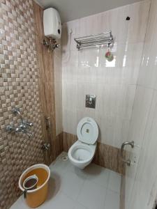 Koupelna v ubytování Hotel Amber-colaba
