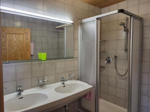 a bathroom with a sink and a shower at Apartment Apart Maashof III by Interhome in Galtür