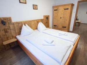 Katil atau katil-katil dalam bilik di Apartment Sonnenblick by Interhome