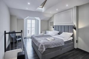 Ein Bett oder Betten in einem Zimmer der Unterkunft Baltic Home