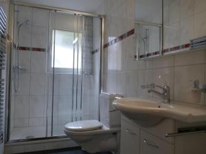 Koupelna v ubytování Apartment Résidence Sans Souci by Interhome