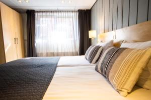 Postel nebo postele na pokoji v ubytování Hotel De Boei