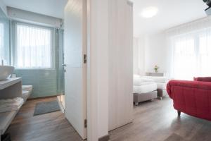 Letto o letti in una camera di Hotel Rolly