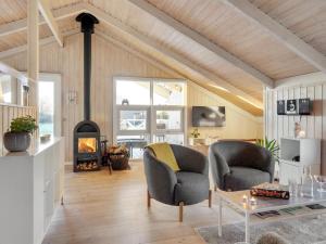 A seating area at Holiday Home Nilsa - 400m from the sea in Funen by Interhome