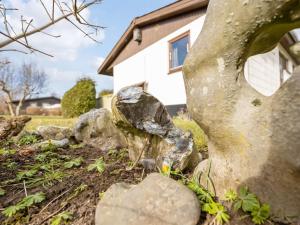 a rock garden in front of a house at Holiday Home Henrich - 300m from the sea in Lolland- Falster and Mon by Interhome in Vesterby