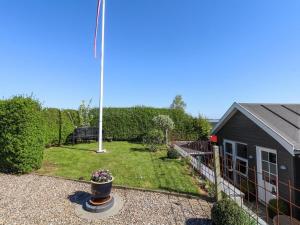 Zahrada ubytování Holiday Home Grim - 5m from the sea by Interhome
