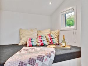 En eller flere senge i et værelse på Holiday Home Kamilla - 200m from the sea in Funen by Interhome