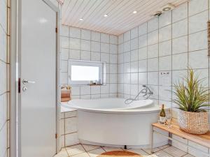 Koupelna v ubytování Holiday Home Faina - 100m from the sea by Interhome