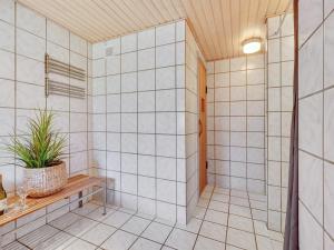 Koupelna v ubytování Holiday Home Faina - 100m from the sea by Interhome