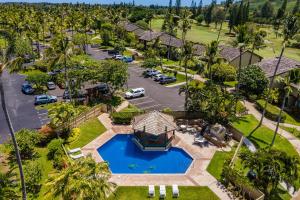 an aerial view of a resort with a swimming pool at Pulelehua Kuilima Estates West #142 in Kahuku