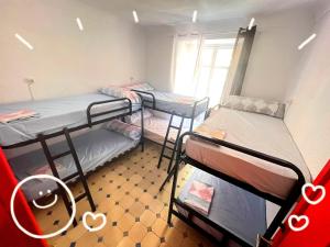Posteľ alebo postele v izbe v ubytovaní La Merced Centro Rooms
