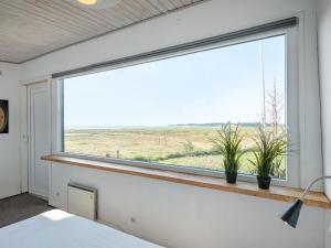 Postel nebo postele na pokoji v ubytování Holiday Home Kaapo - 300m from the sea by Interhome