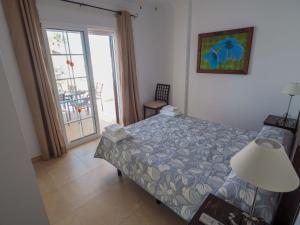 Postel nebo postele na pokoji v ubytování Nerja Paradise Rentals - Villa Las Brisas