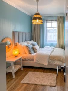 Postel nebo postele na pokoji v ubytování Apartament Akwamaryn