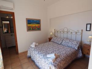 Posteľ alebo postele v izbe v ubytovaní Nerja Paradise Rentals - Villa Los Girasoles