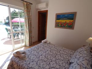 Posteľ alebo postele v izbe v ubytovaní Nerja Paradise Rentals - Villa Los Girasoles