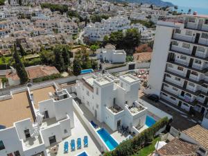 an aerial view of a city with white buildings at Nerja Paradise Rentals - Villa Ambar in Nerja