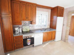 Kuchyň nebo kuchyňský kout v ubytování Nerja Paradise Rentals - Villa Las Palomas