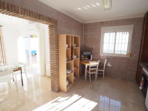 Kuchyň nebo kuchyňský kout v ubytování Nerja Paradise Rentals - Villa Las Palomas