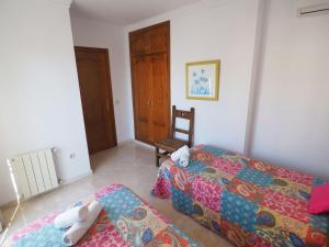 Postel nebo postele na pokoji v ubytování Nerja Paradise Rentals - Villa Las Palomas