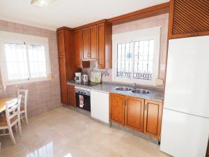 Kuchyň nebo kuchyňský kout v ubytování Nerja Paradise Rentals - Villa Las Palomas