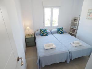 Postel nebo postele na pokoji v ubytování Nerja Paradise Rentals - Villa Catalina + 37 fotografií