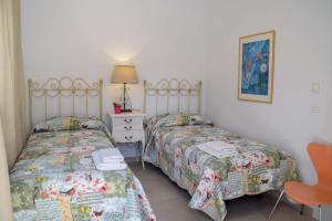 Posteľ alebo postele v izbe v ubytovaní Nerja Paradise Rentals - Villa Valeria