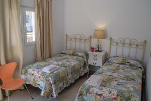 Posteľ alebo postele v izbe v ubytovaní Nerja Paradise Rentals - Villa Valeria
