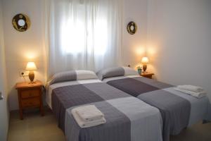 Posteľ alebo postele v izbe v ubytovaní Nerja Paradise Rentals - Villa Valeria