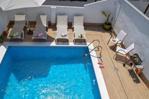Bazén v ubytovaní Nerja Paradise Rentals - Villa Valeria alebo v jeho blízkosti