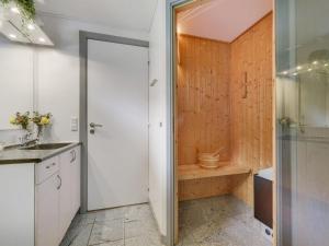 a bathroom with a shower and a toilet in it at Holiday Home Freding - 250m to the inlet in SE Jutland by Interhome in Børkop