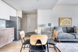 a kitchen and living room with a table and a couch at San Jose 1BR w Gym Pool nr 280 SFO-751 in San Jose
