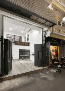 a store front with a fireplace in a building at Hanoi Saga Hotel in Hanoi