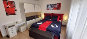 Posteľ alebo postele v izbe v ubytovaní Apartman Perunika