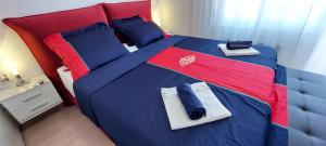 Posteľ alebo postele v izbe v ubytovaní Apartman Perunika