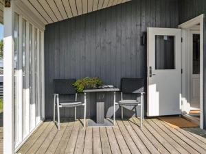 Balkón nebo terasa v ubytování Holiday Home Siri - 400m from the sea by Interhome