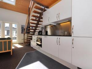 Kuchyň nebo kuchyňský kout v ubytování Apartment Dineke - 200m to the inlet in NW Jutland by Interhome