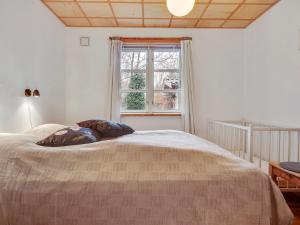 Postel nebo postele na pokoji v ubytování Holiday Home Flugha - 500m to the inlet in The Liim Fiord by Interhome