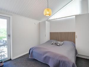 Postel nebo postele na pokoji v ubytování Holiday Home Kukka - 600m from the sea in Djursland and Mols by Interhome