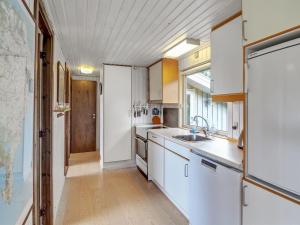 Kuchyň nebo kuchyňský kout v ubytování Holiday Home Ludewiga - 350m from the sea by Interhome