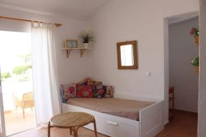 Posezení v ubytování Apartment by the Sea in Cap d'Artrutx