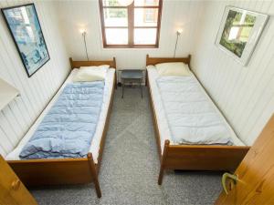 Postel nebo postele na pokoji v ubytování Holiday Home Gunhil - 200m from the sea by Interhome