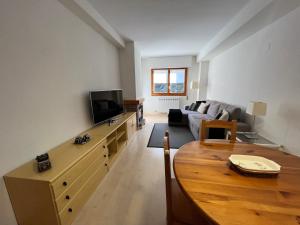TV a/nebo společenská místnost v ubytování Apartamento Muga