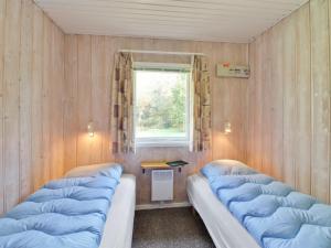 Postel nebo postele na pokoji v ubytování Holiday Home Zenitha - 300m from the sea by Interhome