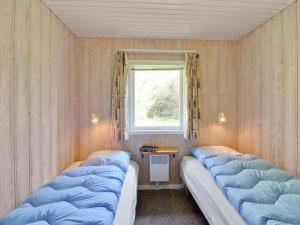 Postel nebo postele na pokoji v ubytování Holiday Home Zenitha - 300m from the sea by Interhome + 18 fotografií