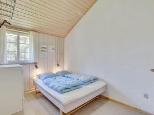 Postel nebo postele na pokoji v ubytování Holiday Home Kristián - 400m from the sea by Interhome + 13 fotografií