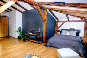 Posteľ alebo postele v izbe v ubytovaní VIP Apartamenty